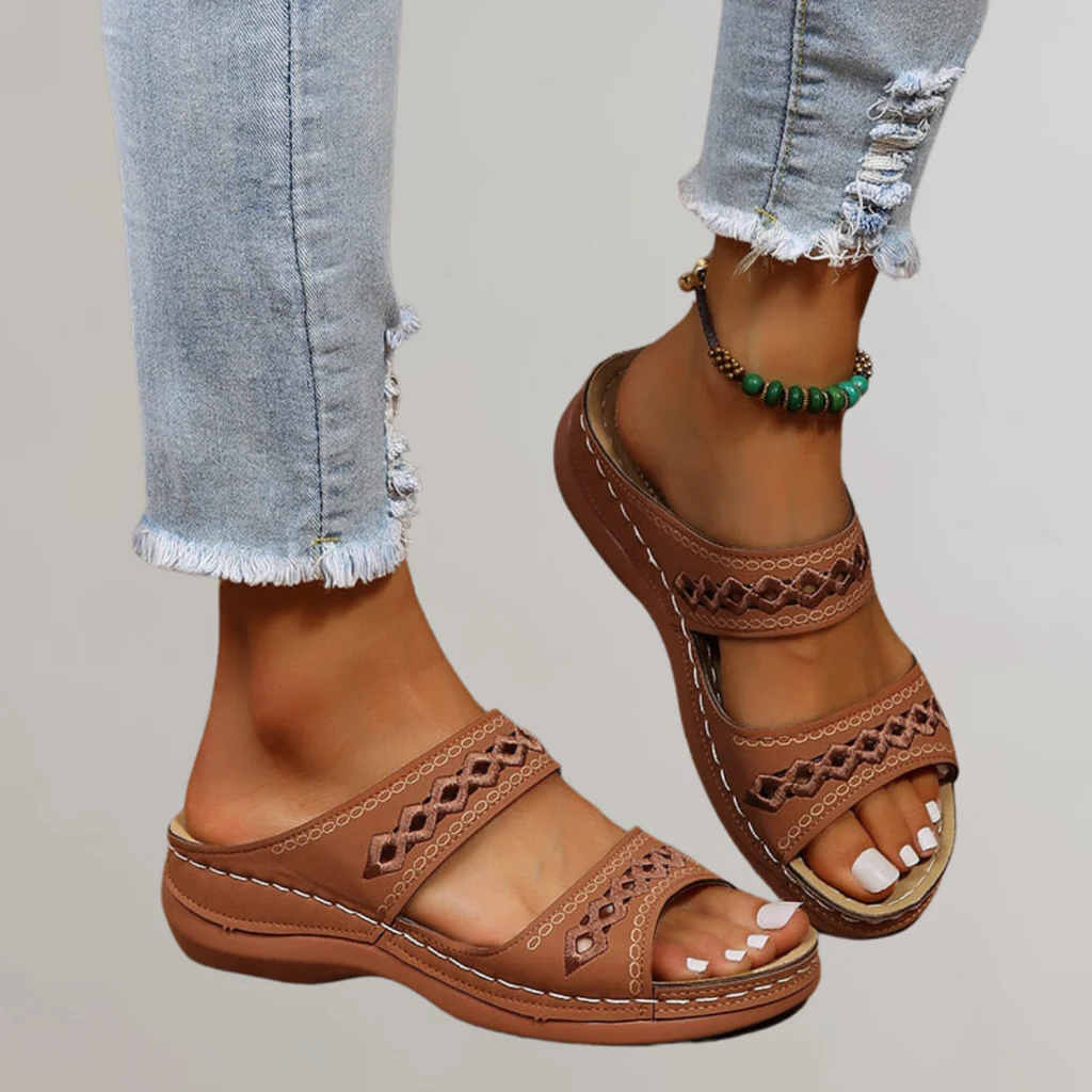 Comfortable women's orthopedic sandals, featuring arch support & open-toe design for casual summer walking.