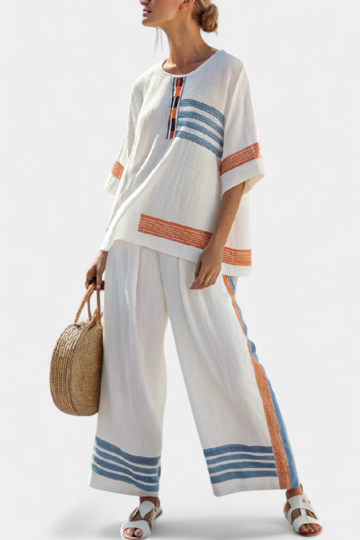 Women's sophisticated blue-orange striped top and pants set, a chic two-piece for spring summer casual wear.