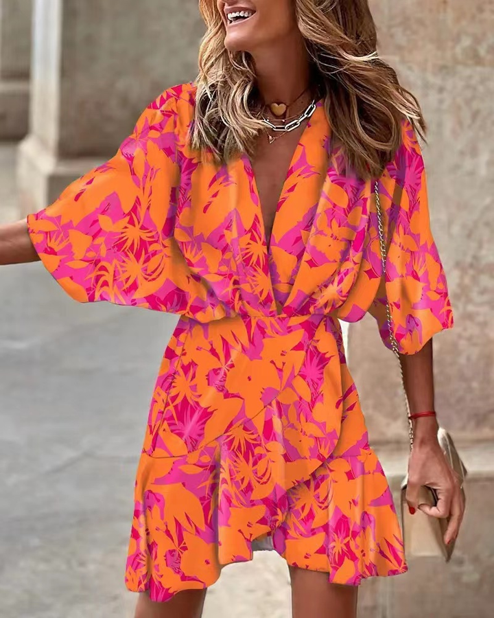 Orange ruffled boho mini dress for women, chic and flowy, perfect for summer casual wear.