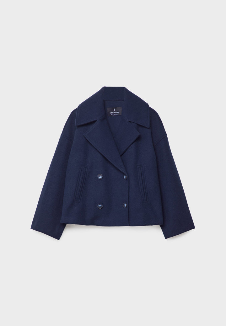 Modern women's spring-summer jacket. Elegant, lightweight double-breasted design in a stylish, versatile cut.