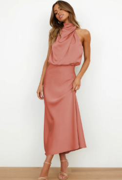 Close-up of elegant midi dress fabric, highlighting quality and chic detail for women's fashion.