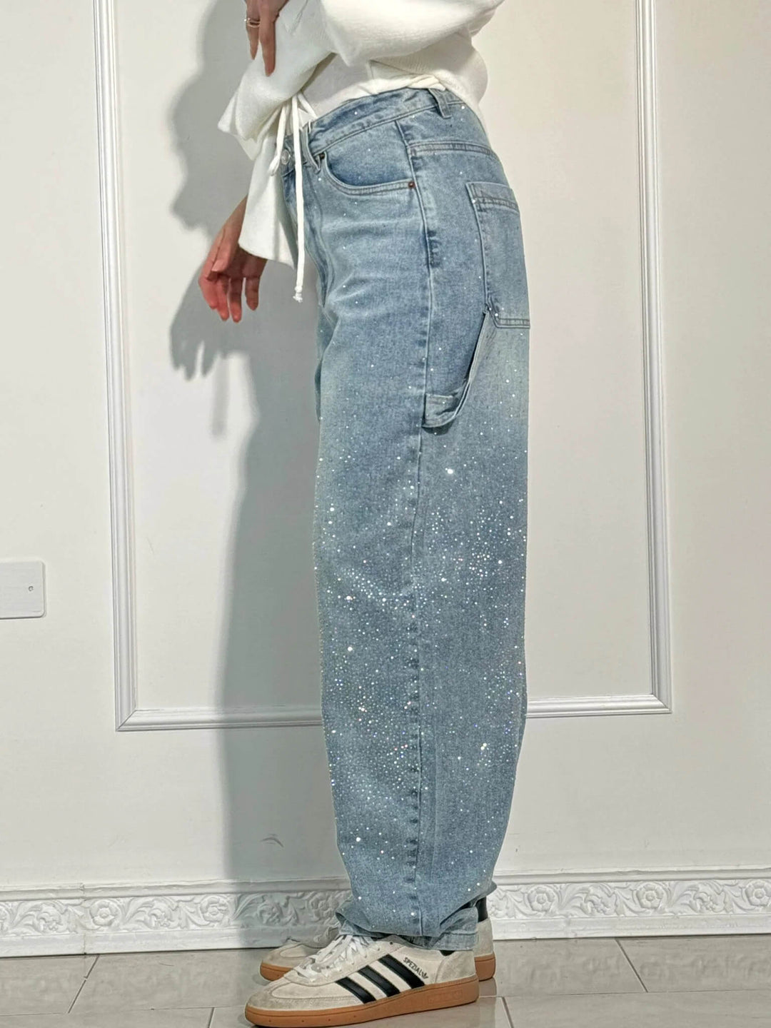 Comfortable women's high-waist straight leg trousers, styled for a smart casual look.