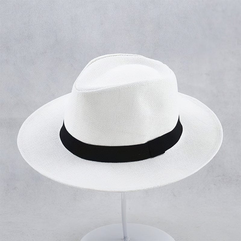 Unisex handmade Panama hat in natural straw, offering stylish sun protection for beach or summer days.