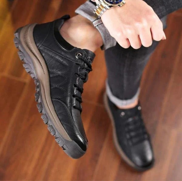 Stylish men's textured low top shoes with rugged design and lace-up closure for men's fashion.