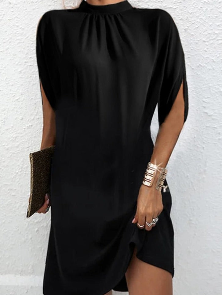 Elegant women's modern dress with stylish batwing sleeves and a round neck, perfect for chic versatile fashion.