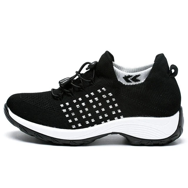 Supportive women's sneakers, engineered for walking, offering ergonomic comfort & pain relief.