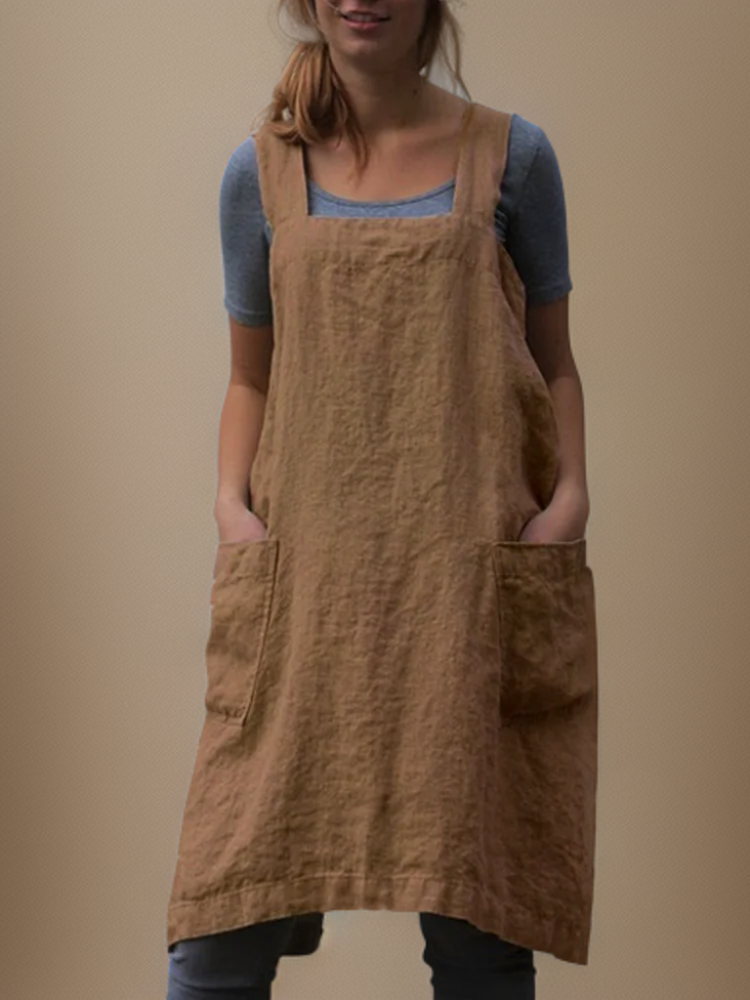 Casual women's apron dress with a chic cross-back design & convenient pockets for everyday wear or chores.