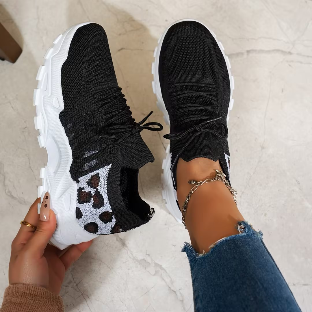 Everyday women's trainers with arch support, ergonomic design, and shock-absorbing comfort.