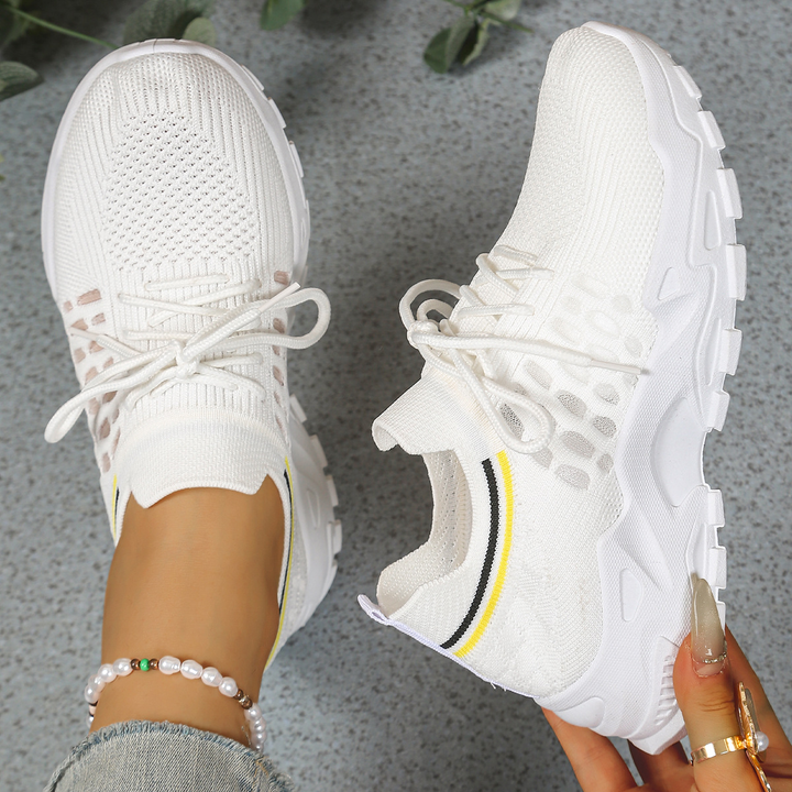 Athletic women's orthopaedic shoes, ideal for everyday wear, offering superior arch support.