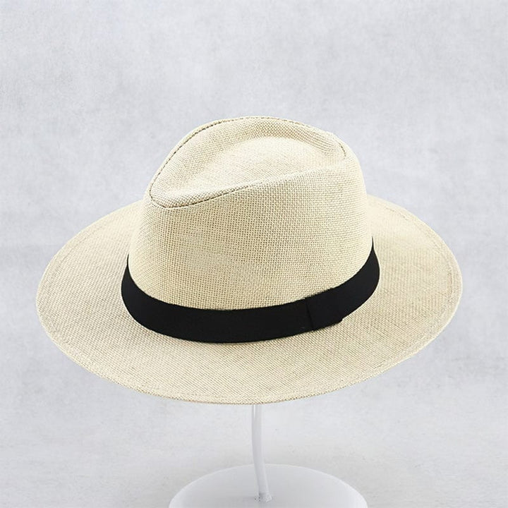 Close-up of premium handwoven straw on a unisex Panama hat, showcasing quality craftsmanship & sun protection.