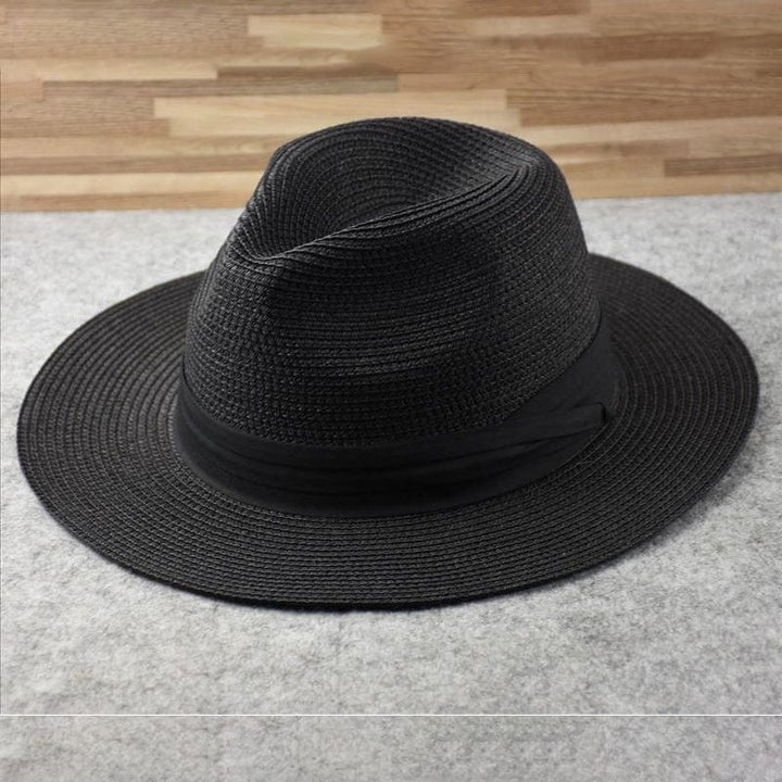 Elegant unisex straw Panama hat, combining sophisticated style with essential sun protection for all your summer events.