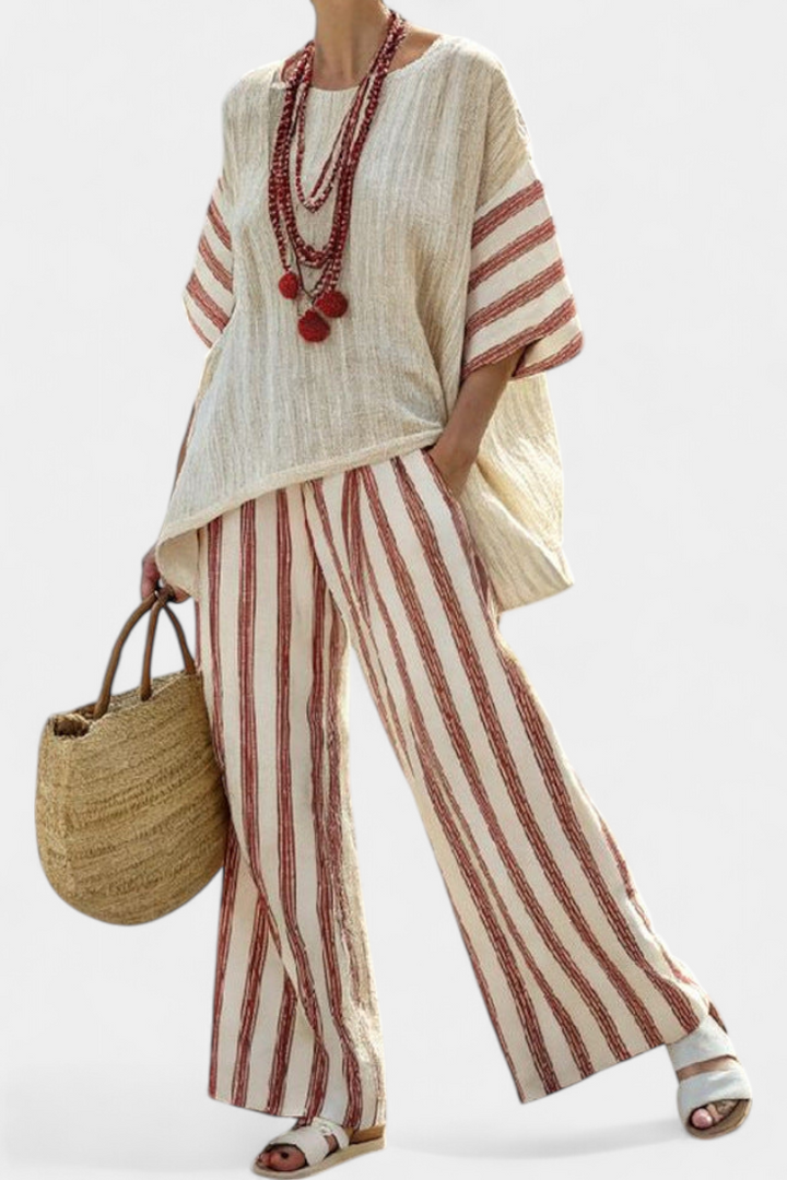 Women's elegant striped top & wide-leg pants set. Comfortable two-piece summer outfit for casual chic style.