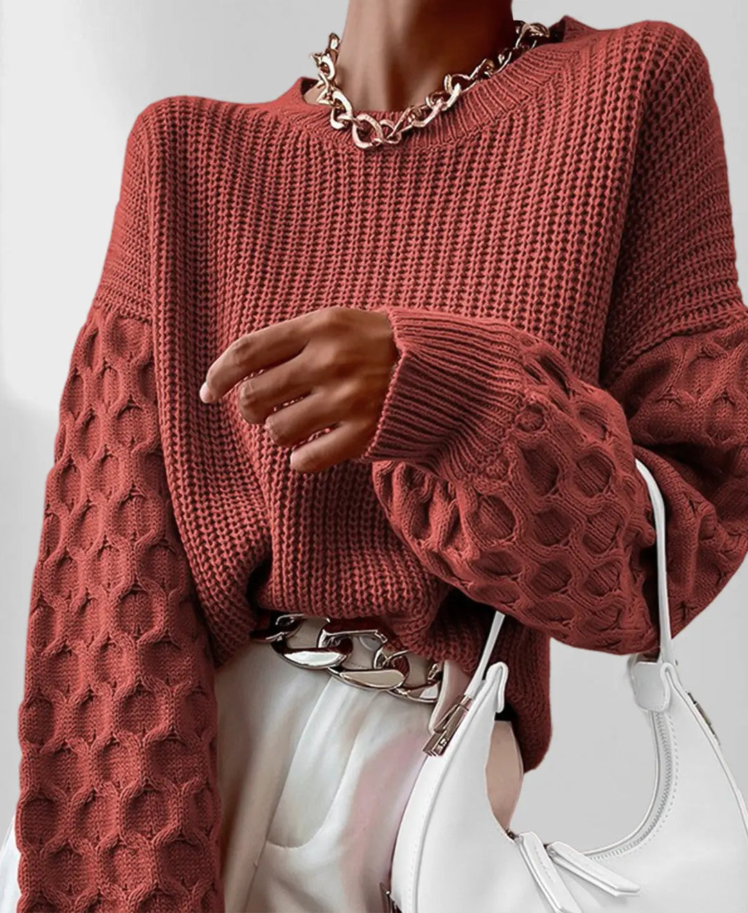 Front view of the women's cozy spring knit sweater. Stylish pullover for women's apparel. Cozy top.