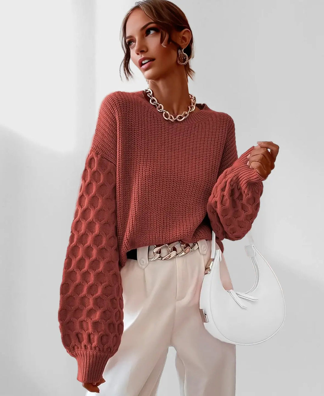 Stylish women's spring sweater modeled, showcasing its comfortable fit & chic design. Fashion pullover.