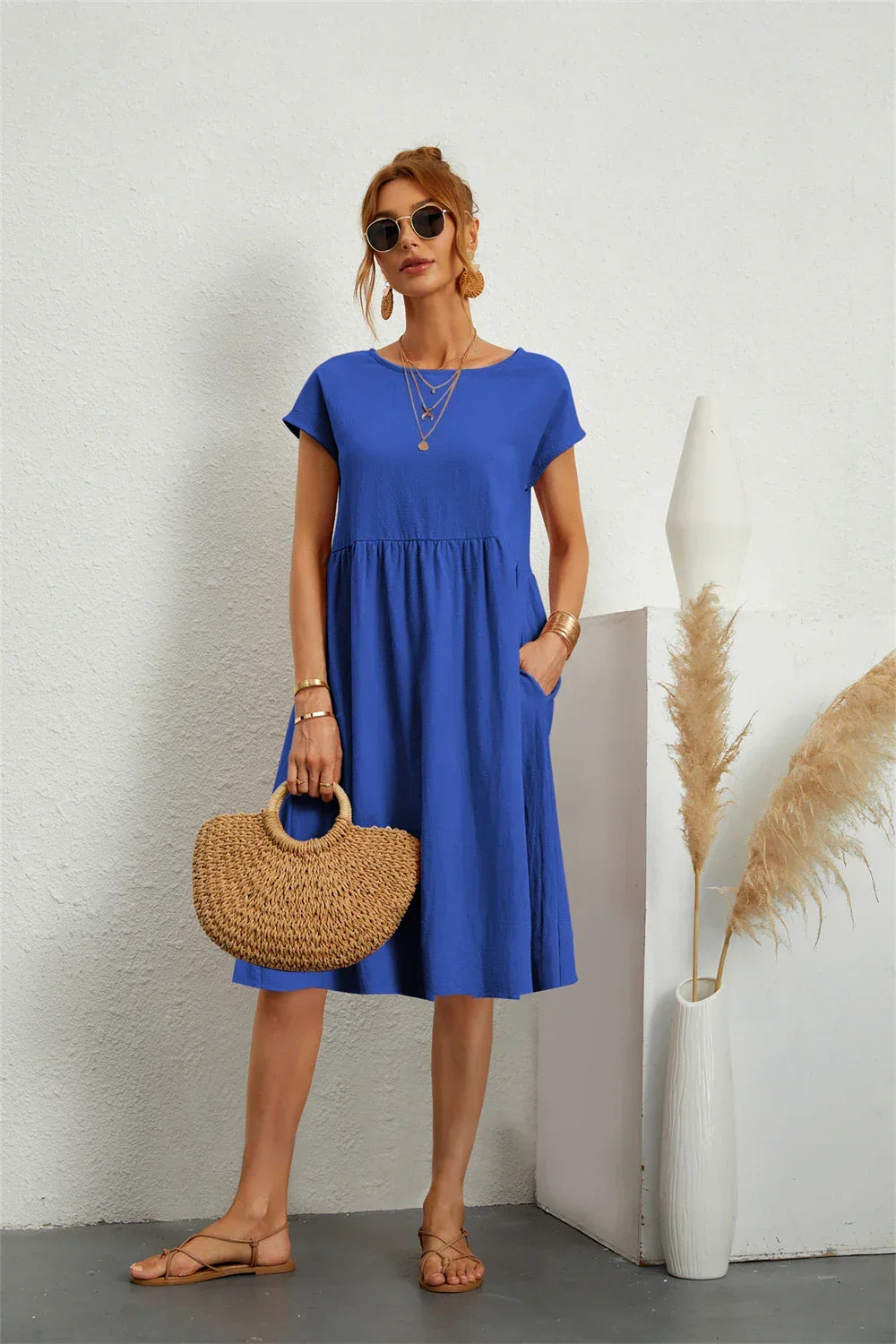 Women's everyday midi dress, super comfortable, loose fit, and featuring convenient pockets.