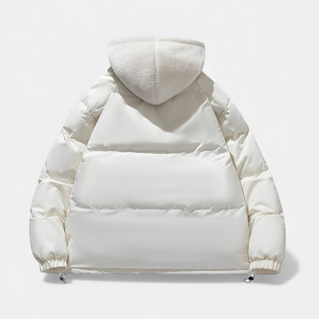 Warm men's winter coat, featuring insulation for cold weather outdoor activities & style.