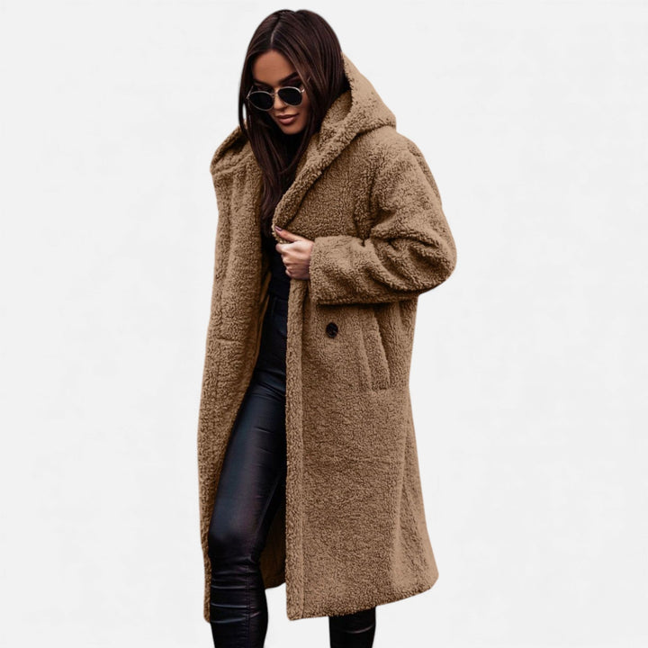 Cozy women's long plush winter jacket, elegant outerwear for ultimate warmth & style.