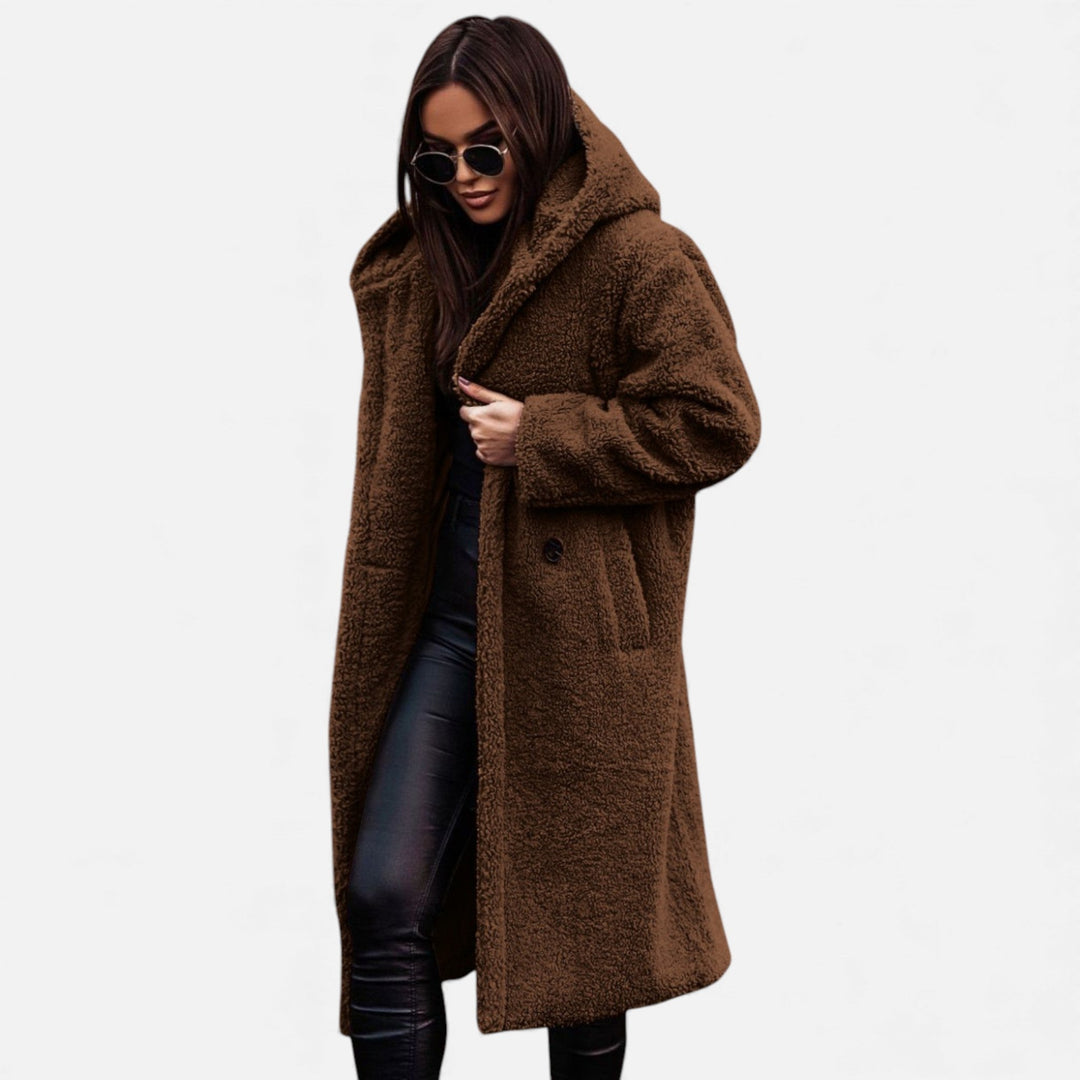 Chic women's plush long winter coat, providing warmth and elegant fashion.