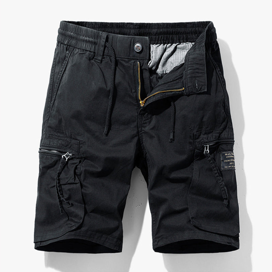 Durable men's cargo shorts for hiking & travel, offering comfort and utility for all outdoor adventures.