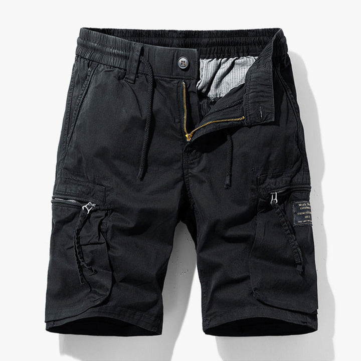 Durable men's cargo shorts for hiking & travel, offering comfort and utility for all outdoor adventures.