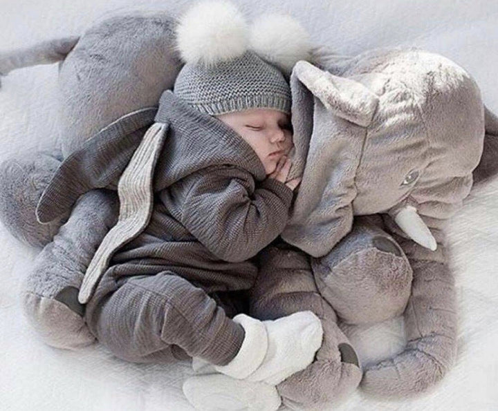 Lovable elephant plush companion pillow for babies, offers soft comfort & adorable nursery decor.