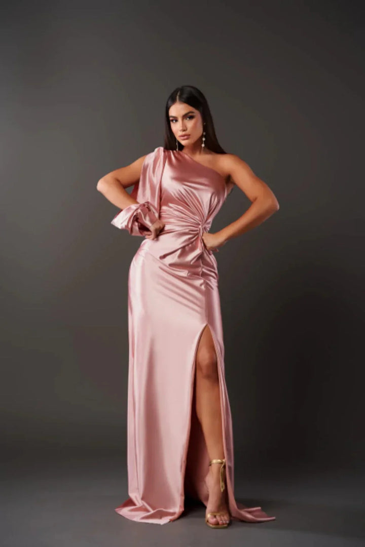 Women's elegant one-shoulder formal dress, styled for a glamorous special occasion look.