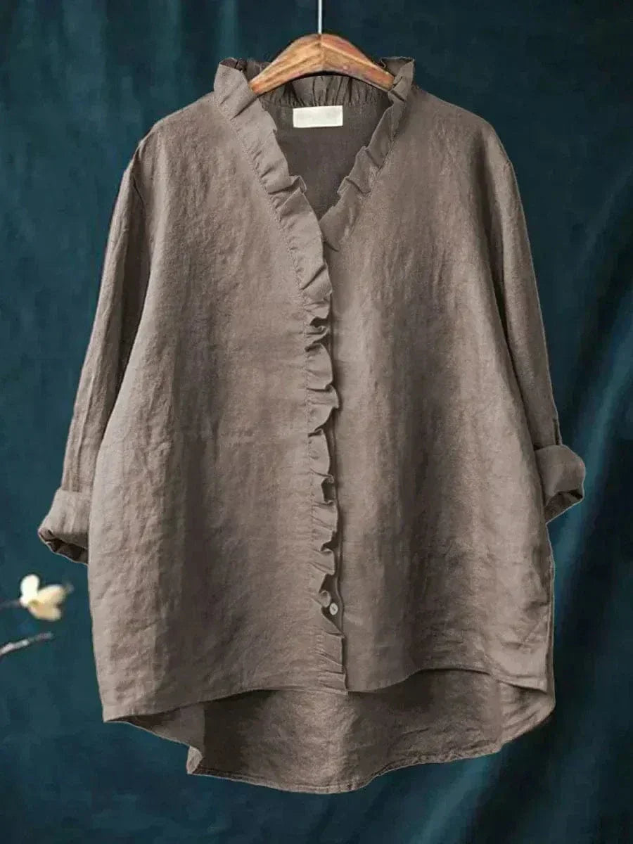 Comfortable women's ruffled shirt, perfect for everyday wear or a chic office look. Effortless long-sleeve style.