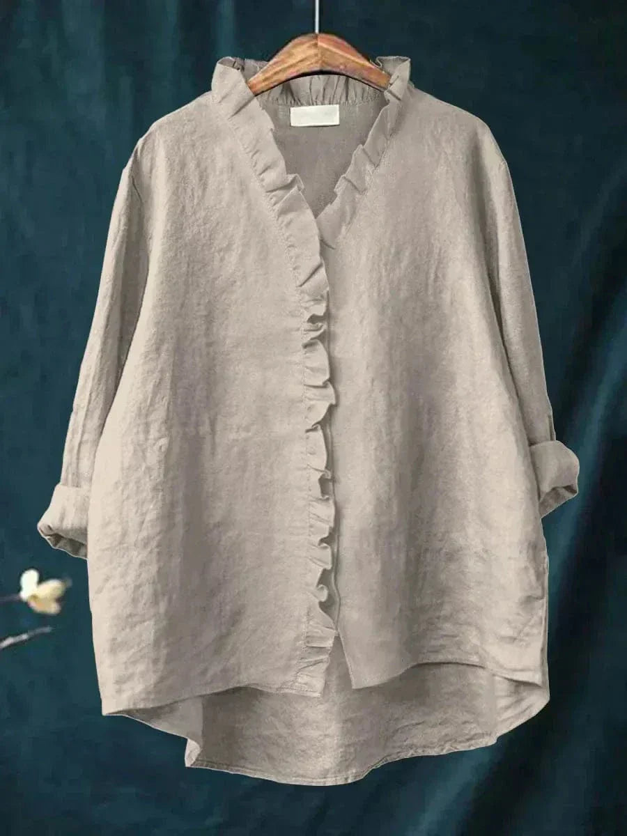 Beautiful women's ruffled long-sleeve top, designed for effortless style and all-day comfort.