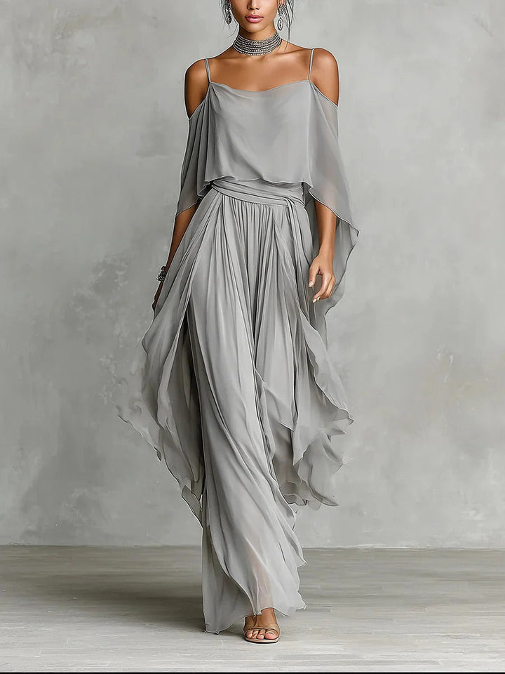 Elegant grey women's off-shoulder two-piece set with flowy wide-leg trousers, perfect for summer vacation wear.
