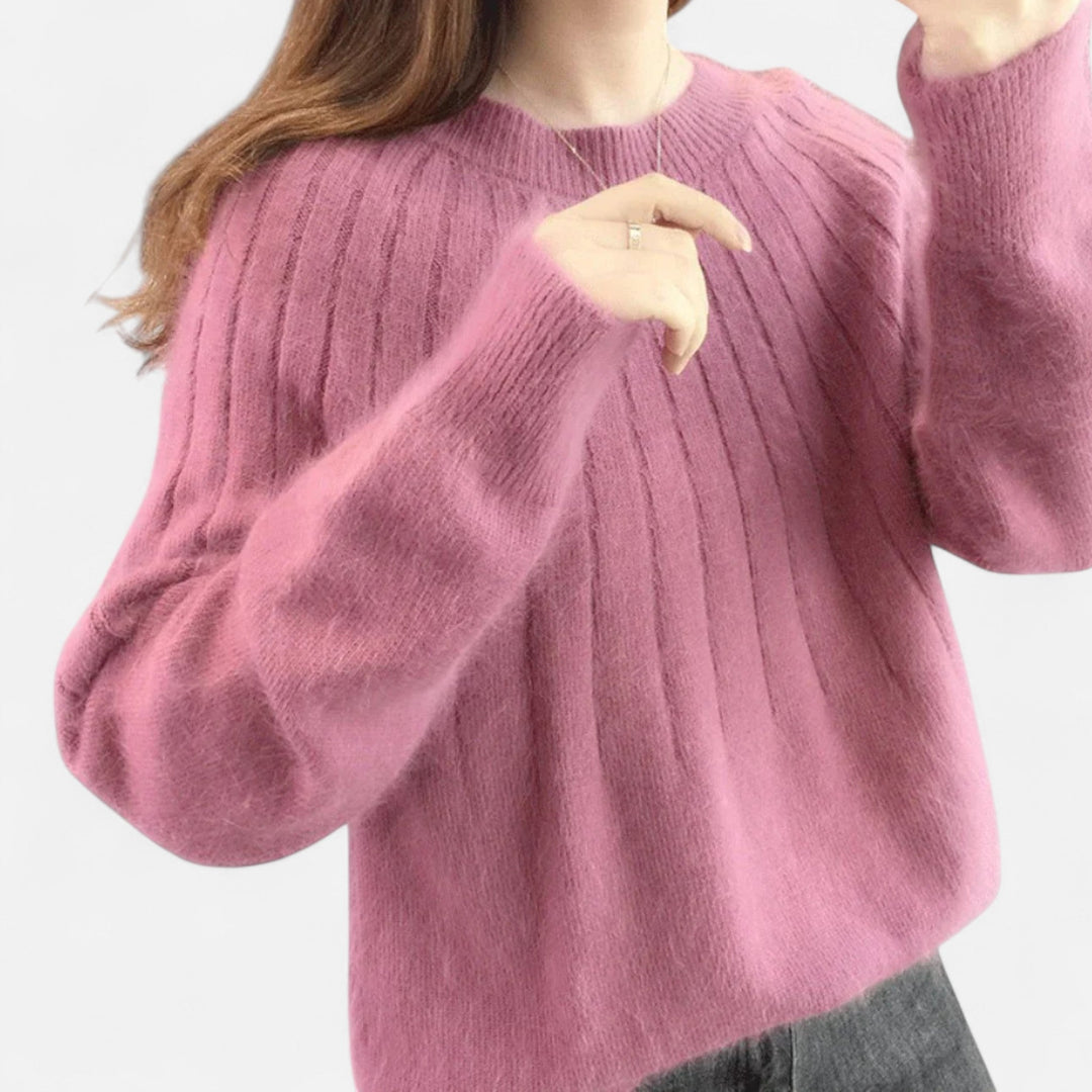 Elegant women's knit pullover sweater, offering a relaxed fit and ultimate softness for versatile styling.