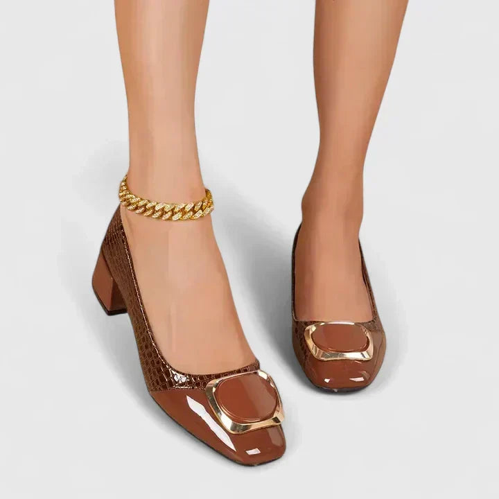 Slip-on women's block heel loafers, ideal closed toe dress shoes for office or smart casual comfort.