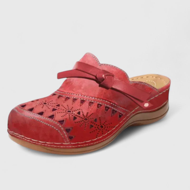 Orthopedic women's sandals with arch support & memory foam for superior comfort, pain relief, & posture.