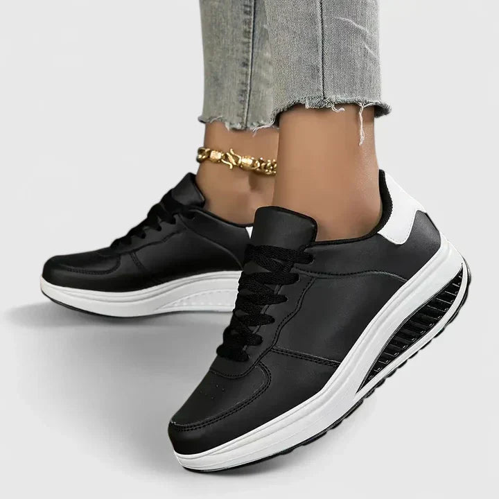 Ergonomic women's athletic sneakers, offering superior foot support & comfort for all-day walking.