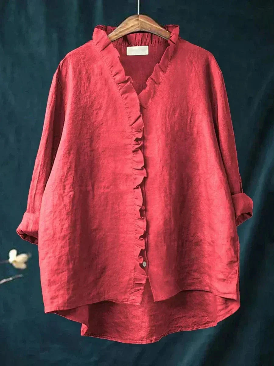Modern women's elegant ruffled blouse. Long sleeve design suitable for work, casual, or formal attire.