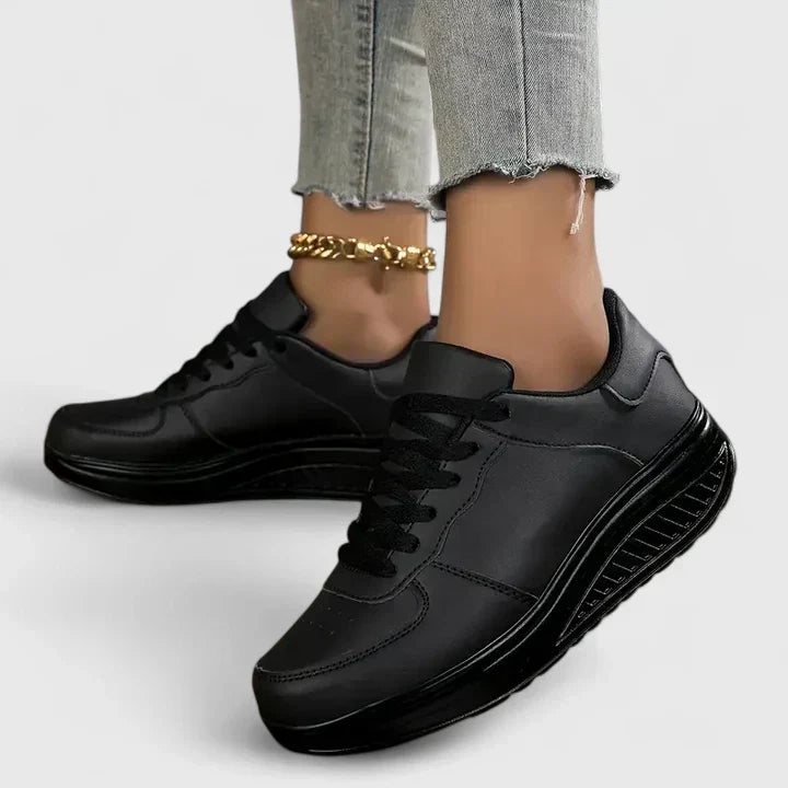 Stylish casual women's trainers with orthopaedic design, providing arch support for comfortable daily wear.