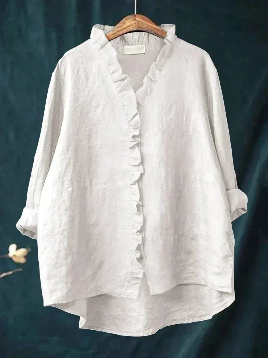 Women's elegant ruffled long-sleeve blouse for versatile casual and formal wear, offering chic style and comfort.
