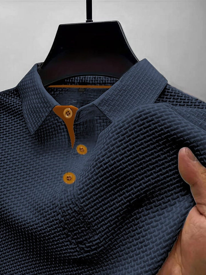 Stylish button-down men's polo shirt, blending timeless design with modern appeal for any occasion.