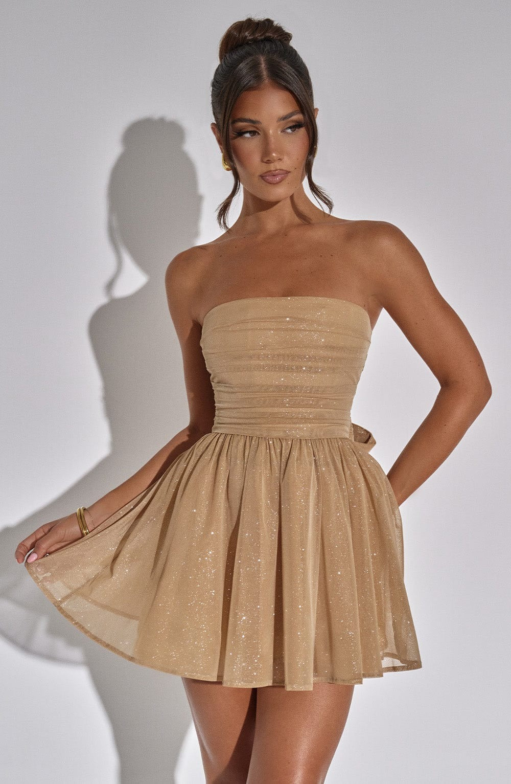 Modern fitted off-shoulder mini dress for women, ideal for special occasion & evening events.