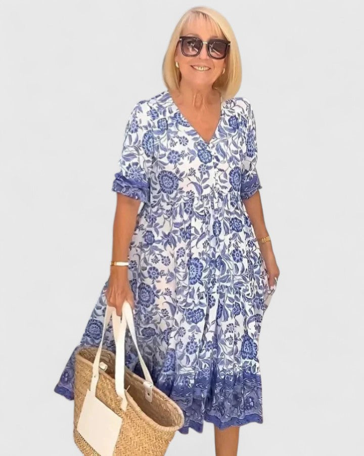 Elegant women's V-neck midi dress with a flattering fit, perfect for spring/summer chic style.