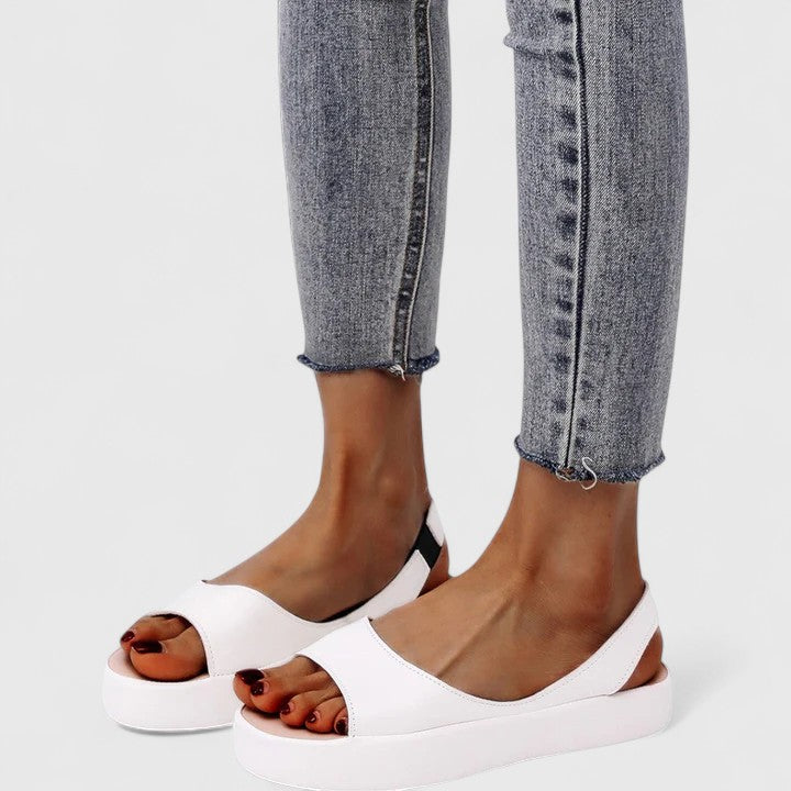 Discover ultimate comfort with Women's Emrynn Orthopedic Sandals. Stylish everyday slip-on shoes for women.