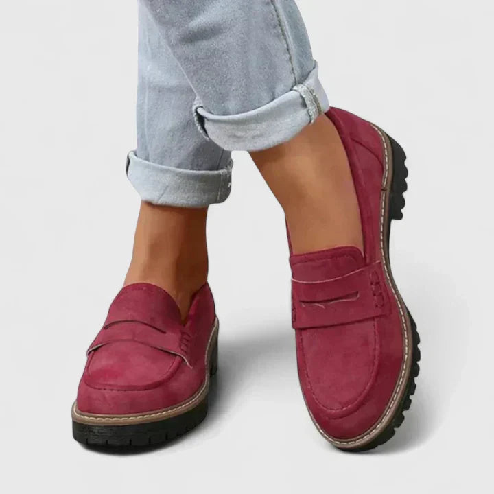 Stylish women's slip-on loafers, offering orthopaedic arch support and plush cushioning for comfortable everyday wear.