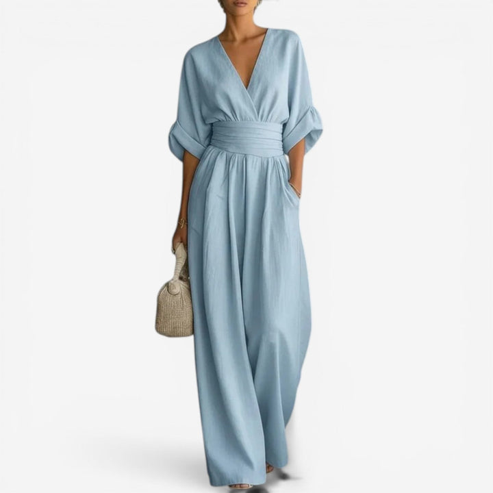 Women's elegant wide sleeve V-neck jumpsuit in a rich color, perfect for chic effortless style.