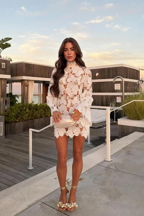 Elegant women's white high neck long sleeve floral pattern mini dress, perfect for parties & special occasions.