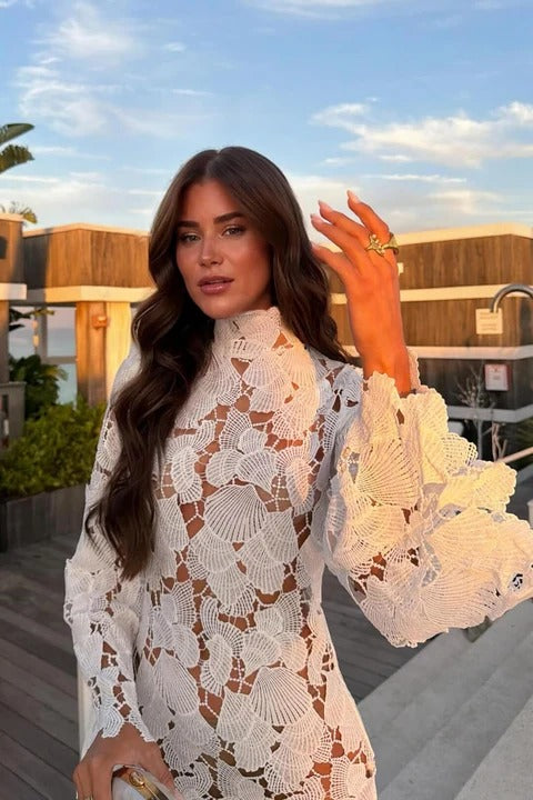 Stylish women's fitted high neck floral mini dress with long sleeves, ideal for evening wear & parties.