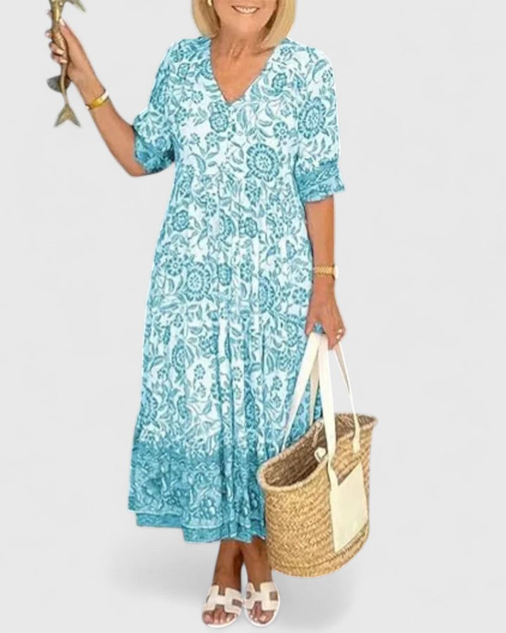 Versatile women's elegant midi dress. Features a V-neck, half sleeves, and chic style for any event.