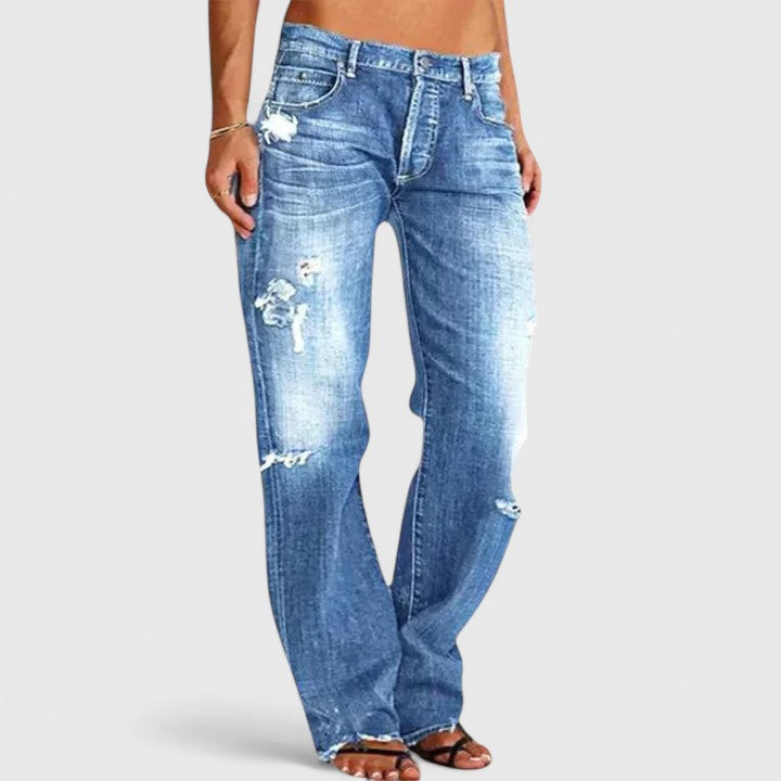 Women's elegant wide-leg jeans with a relaxed, low-rise fit, perfect for comfortable and versatile style.