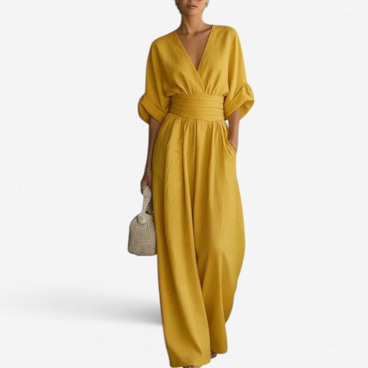 Chic wide sleeve V-neck women's jumpsuit, ideal for casual wear, vacation, or elegant events.