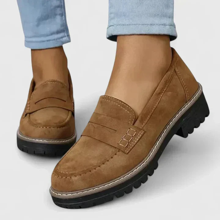 Women's comfortable slip-on loafers with orthopaedic arch support for everyday wear. Cushioned casual flat shoes.