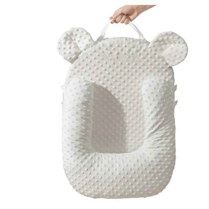 Adjustable anti-reflux infant feeding pillow, providing optimal baby support for happy, spit-up-free mealtimes.