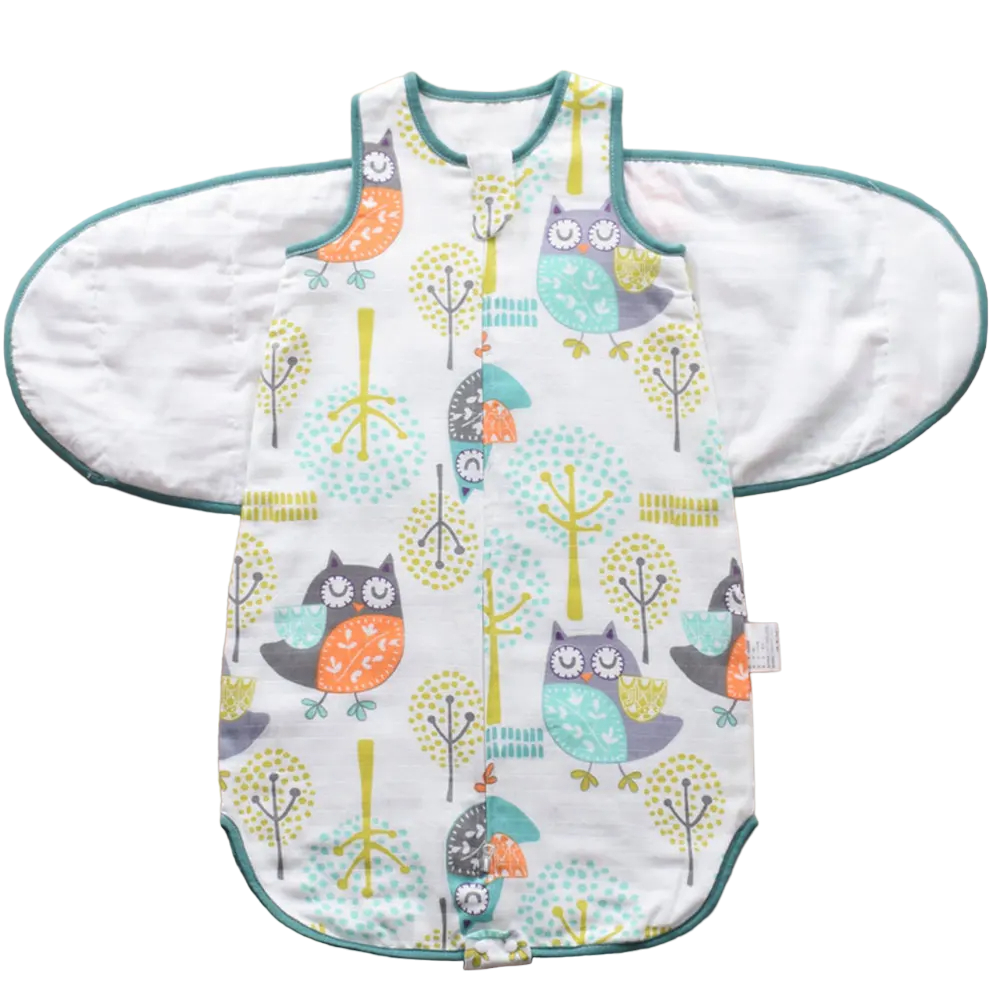 Unisex infant cotton wearable blanket and diaper wrap for comfortable, undisturbed baby sleep.